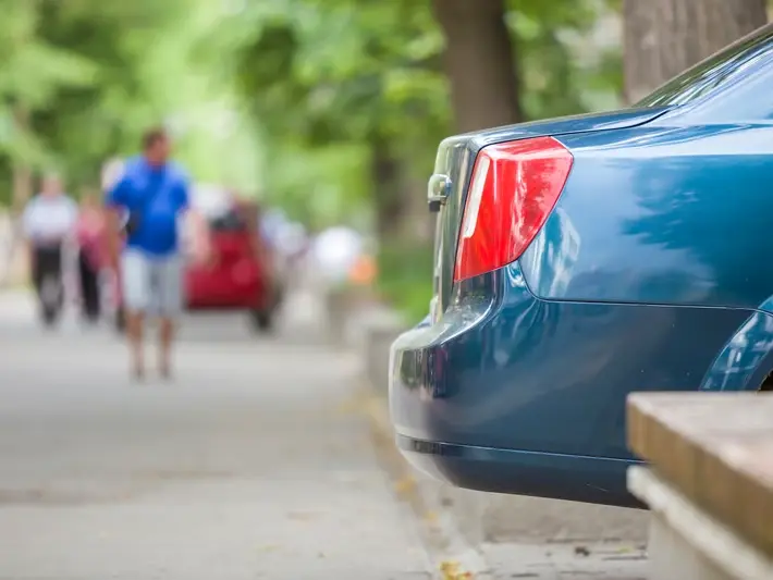 Glendale AZ Uber accident claim investigation along Loop 101 corridor with retail parking lot impact scene